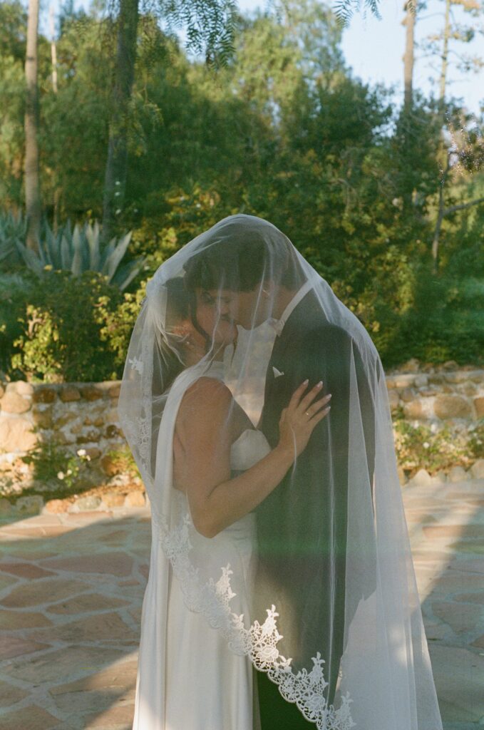 Bride and groom portraits during golden hour at Leo Carillo Ranch in Carlsbad, California.