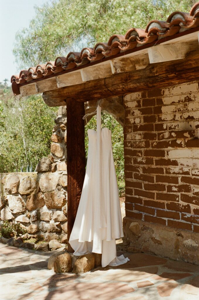 Bride’s wedding dress captured in detail at Leo Carillo Ranch.