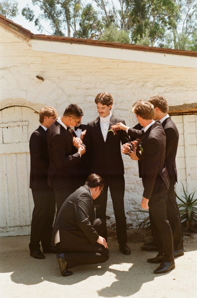 Charlie and his groomsmen getting ready for the wedding at Leo Carillo Ranch in Carlsbad, CA.